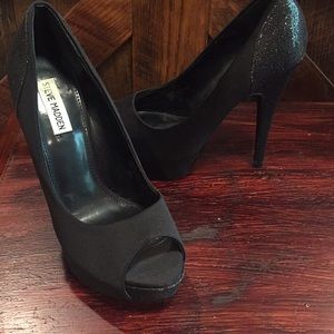 Black Steve Madden size 9.5 platform heels.